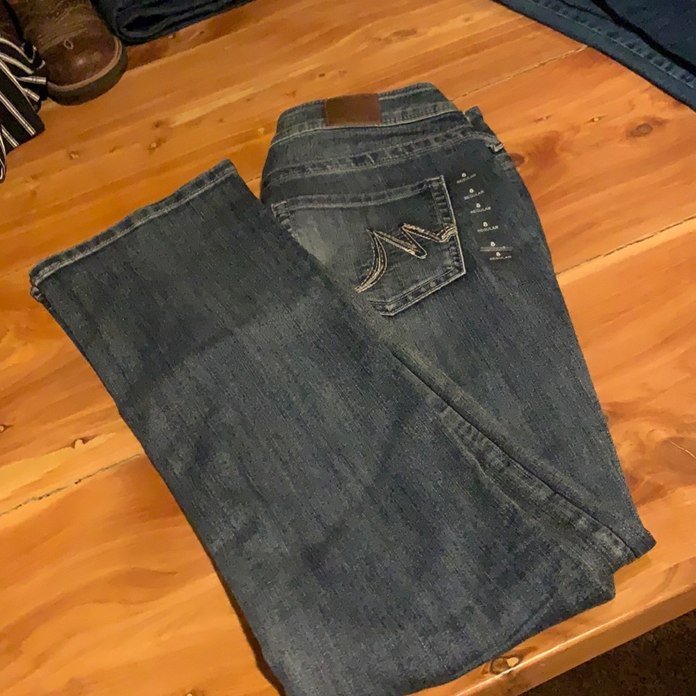 Maurices light wash boot cut jeans size 8